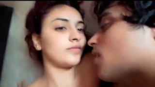 Hot slim girlfriend kissing with boyfriend